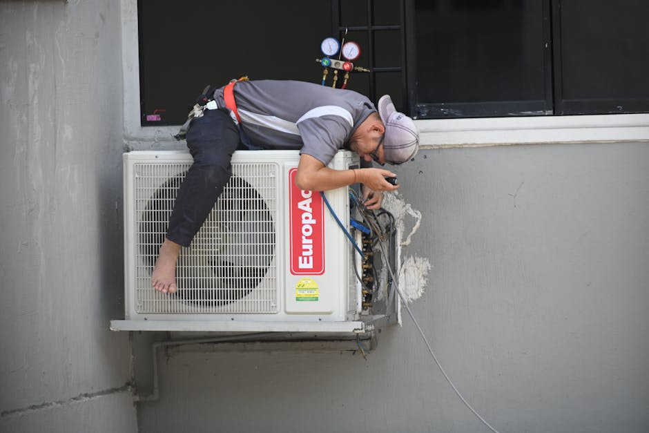 HVAC technician working on a modern climate control system